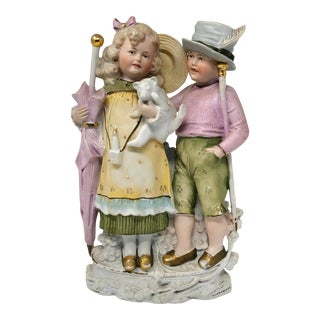 Antique German Bisque Figurine of a Boy and Girl For Sale