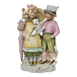 Antique German Bisque Figurine of a Boy and Girl