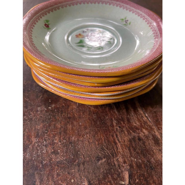 We love all things Calyx. lovely set of seven saucers, hand painted with a tiny floral pattern and the center, in soft...