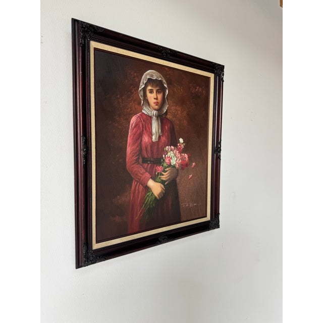 Elegant vintage painting depicting a woman holding flowers, executed in oil on canvas. The composition is graceful and...