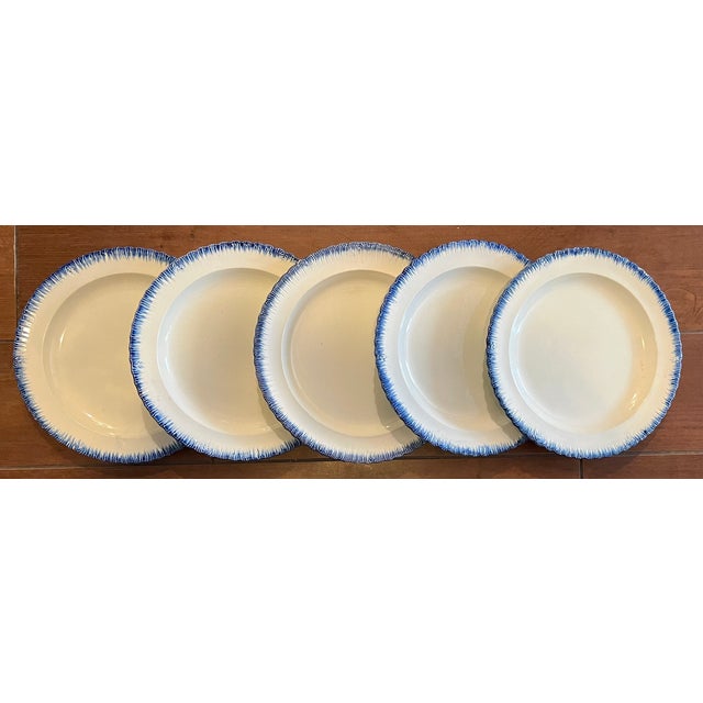 Set of five antique early 19th century English George III pearlware blue feather edge dinner plates. Each measures 10"...