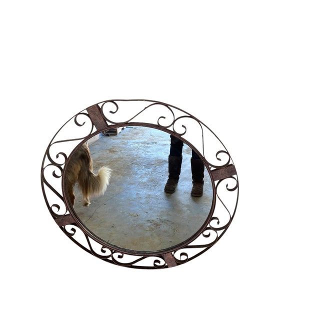 Gorgeous hand forged vintage wrought-iron mirror made in the United States. This is a beautiful mirror that will enhance...