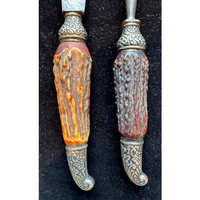 Antique stag handle & bone cutlery - 5 pieces Detailed in sterling silver Largest knife with reddish/brown stag handle has...