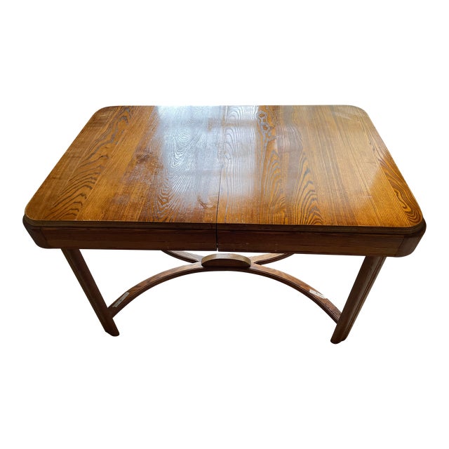 Early 20th Century Solid Oak Dining Table With Stored Table Leaf For Sale