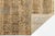 Elevate high-end interiors with this vintage hand-knotted wool area rug. Featuring a grid-paneled composition of geometric...