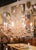Pair of French Louis XV Painted Tole and Crystal Eight-Light Chandeliers For Sale - Image 9 of 13