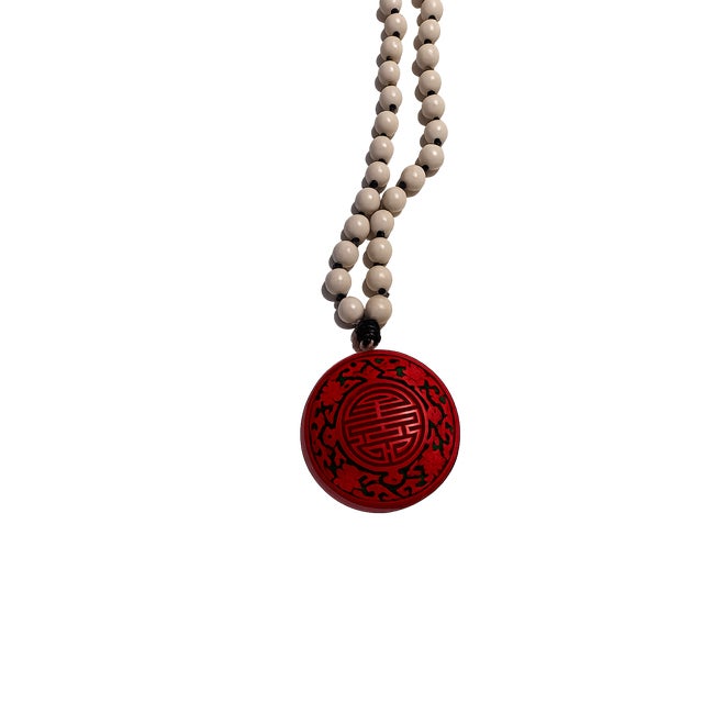 Beaded and hand-knotted with colored leather cord. The brasses were especially popular in mid-1800’s England, the brass...