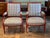 Pair of red painted fauteuils in the Louis XVI taste, the square backs carved with ribbon twist borders and crested with a...