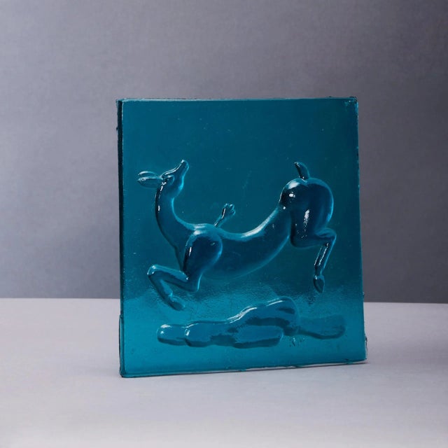 Molded glass tile depicting a wounded gazelle by Napoleone Martinuzzi (1892-1977) circa 1930 for Venini, molded mark 'NM'....