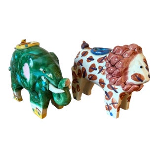 Pair of Sculpted Ceramic/Clay Whimsical Lion & Elephant Candlesticks For Sale