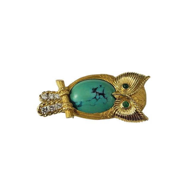 Vintage Cartier 18K Turquoise, Emerald and Diamond Owl Brooch This exquisite brooch by Cartier features a cabochon...