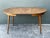 This exceptional vintage dining table is a masterclass in American woodwork, showcasing the rare and luminous beauty of...