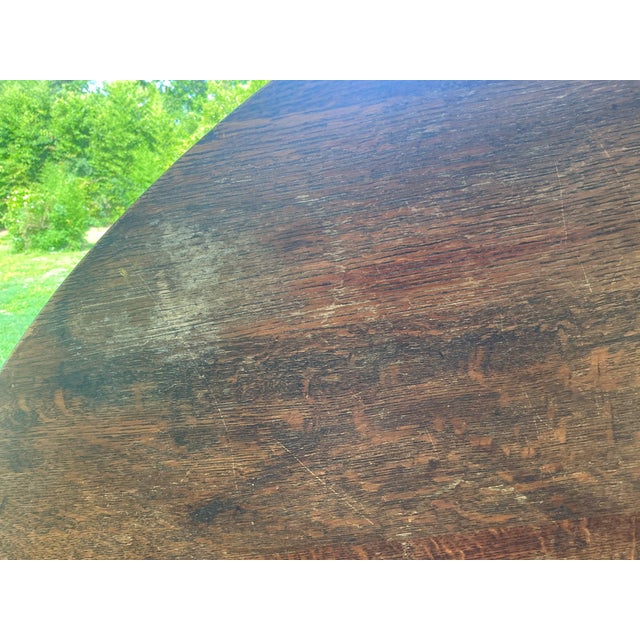 Banta quarter sawn oak Mission style round dining table. No insert available. Needs cleaning and conditioning. Table needs...