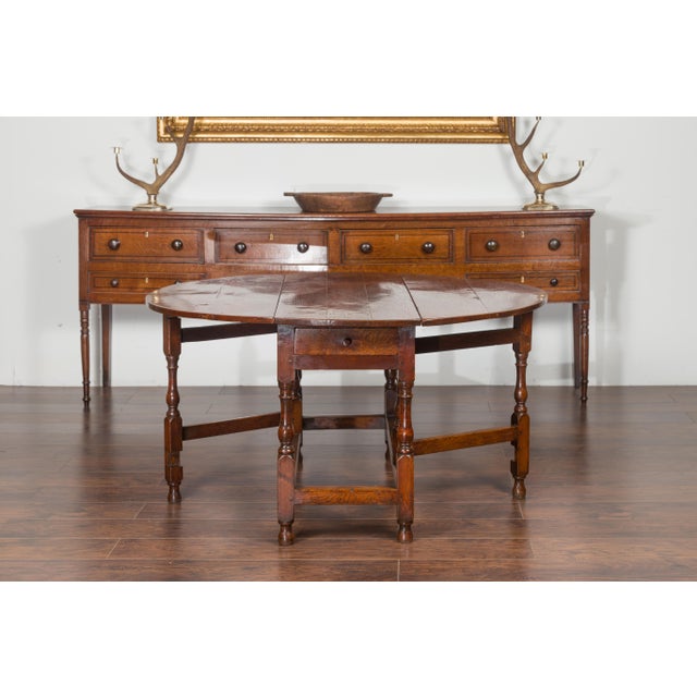 English Oval Oak Drop-Leaf Table with Single Drawer and Baluster Legs For Sale - Image 10 of 11