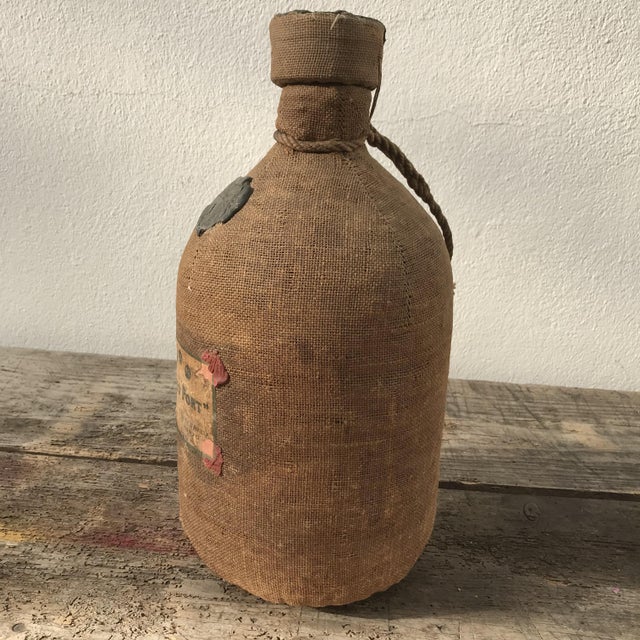 Own a piece of history with this antique Douro Port bottle—an aged treasure from Portugal exuding rustic charm and...