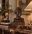 Striking vintage Classical-style portrait bust sculpture signed L. Baldaccini, depicting an elegant woman with finely...