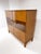 1930's Swedish Art Deco Cabinet. Birch wood cabinet with rosewood inlays. Two large doors conceal interior adjustable...