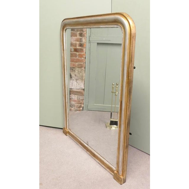Tall French Silver and Gold Louis Philippe Wall Mirror This is a very beautiful Large Statement or Stand Alone Piece from...