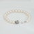 Mid-Century Modern Mid 20th Century Tiffany & Co 7.5mm Pearl Bracelet Signature 18k White Gold X Clasp Estate For Sale - Image 3 of 6