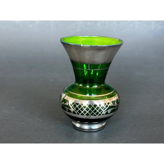 This sweet little green glass vase has a lovely sterling silver overlay design. Fill the small vase with petite flowers...