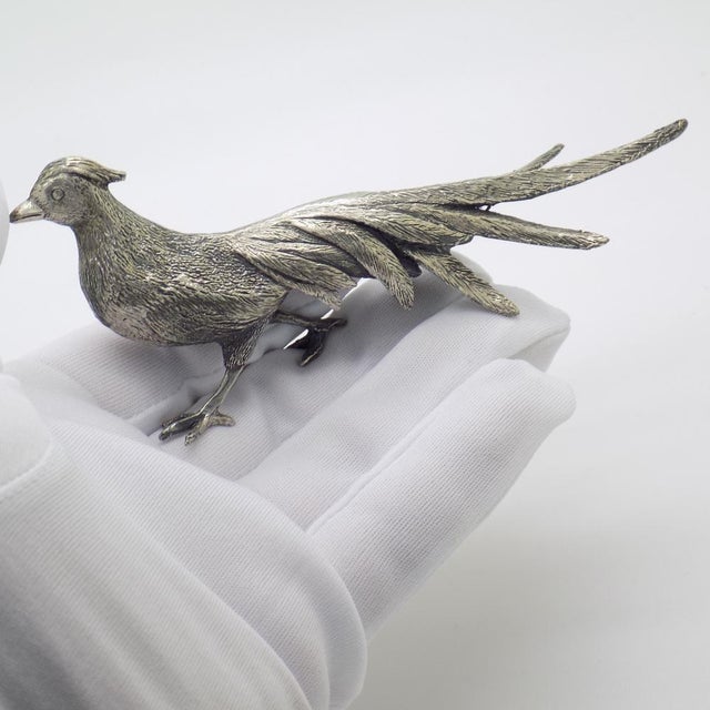 A fascinating vintage object depicting a large, elongated pheasant, handcrafted in Arezzo, Italy between the 1960s and...