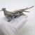 A fascinating vintage object depicting a large, elongated pheasant, handcrafted in Arezzo, Italy between the 1960s and...