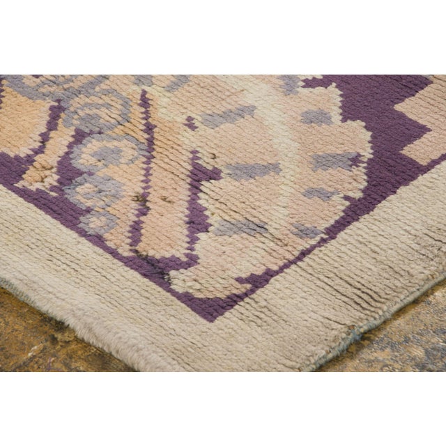 Hand-knotted in wool and originating circa 1950-1959, this 3x6 vintage French Art Deco runner joins Rug & Kilim’s Art Deco...