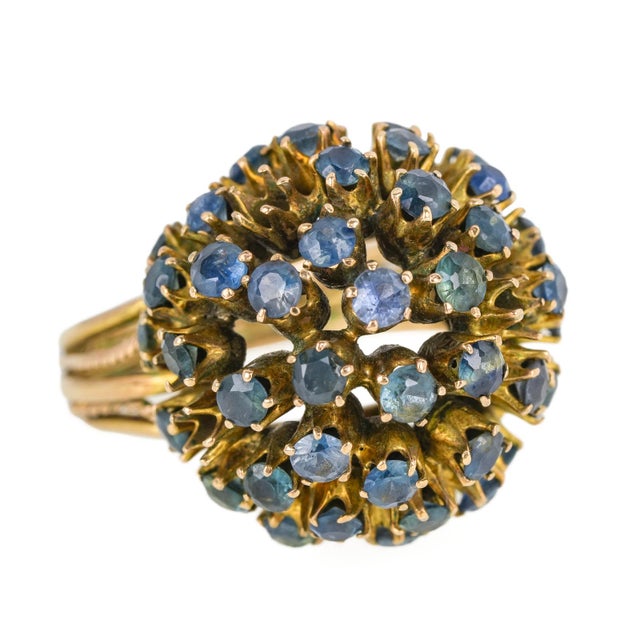 Vintage 10K Yellow Gold and Blue Topaz Cluster Cocktail Ring, designed around a dramatic approximately 20 mm spherical...