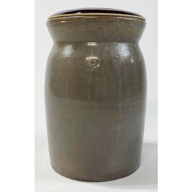 Large late 19th C antique salt glazed stoneware crock with lid. Numbered "2" on body. Brown lid with handle. No maker...
