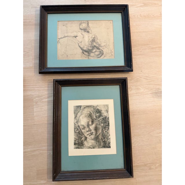 Vintage pair of 1980s framed, Tiffany blue mat black and white prints. Hor