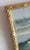 Vintage framed painting on board of a moored sailboat. Newer gold frame finishes this piece perfectly. Signed by the...