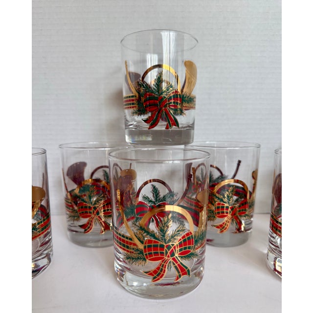 This festive vintage set of Culver lowball glasses features the collectible “Yule Horn” pattern, decorated with French...