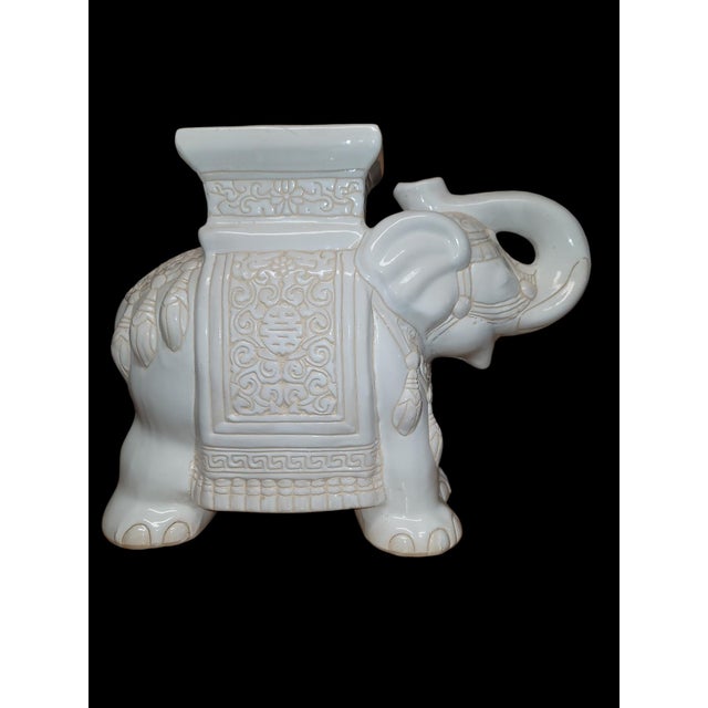 Beautiful vintage 1970's cream colored elephant garden stool. This Asian style ceramic stool has great detail and is...