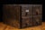 Early 20th-century solid wood card catalog cabinet featuring four deep drawers arranged in a compact two-over-two...