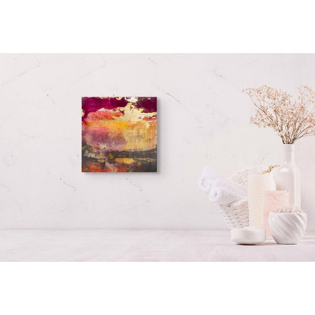 Sky Drama 1 showcases a vibrant interplay of colors, where deep purples and warm golds blend seamlessly to evoke a dynamic...