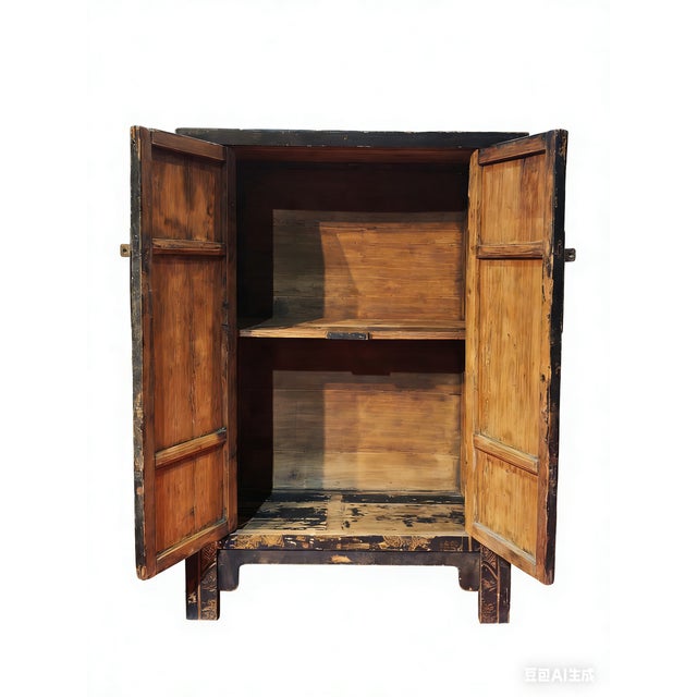 This 19th century cabinet, retrieved from the Shanxi Province in Northern China, is handmade from solid catalpa wood using...