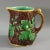Minton Majolica jug/pitcher which features oak leaves and acorns to the sides and a snail to the handle. Colouration:...