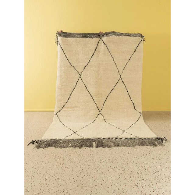 Traditional Beni is a contemporary Berber carpet, which consists of 100% high quality atlasal wool - soft and cozy under...