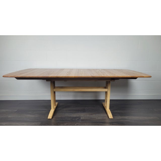 Burford Grand Double Extendable Dining Table from Ercol, 1990s, in Restored conditions. Designed 1990 to 1999 This piece...