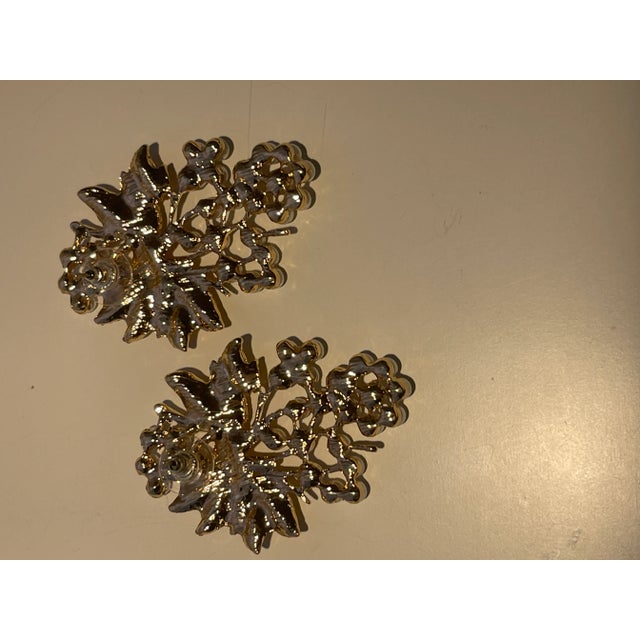 This is part of Chairish’s Fine Jewelry assortment. Pierced seed pearl/gold leaf bouquet earrings