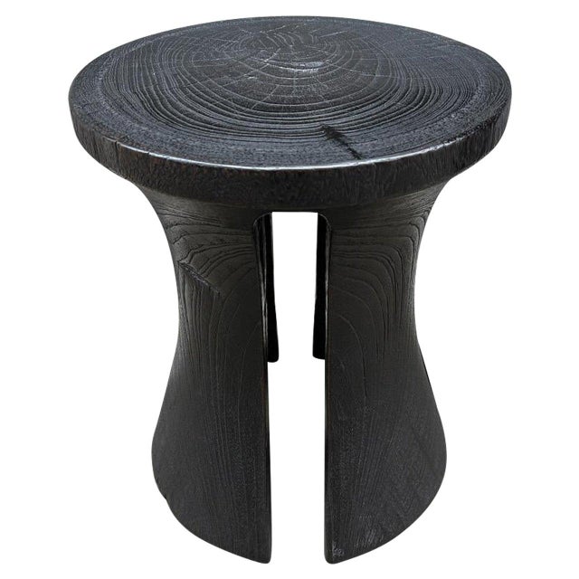 A century old teak wood mortar originally used to grind rice, is repurposed into this minimalist side table or stool. We...