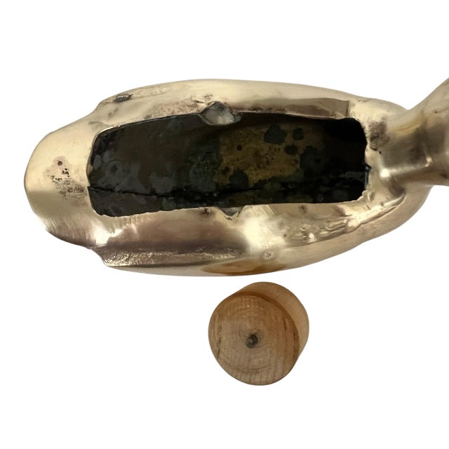 Vintage mid century brass duck tape dispenser. Has wooden tape holder. Some tarnish spots. See pictures. Measures 5.5” w c...