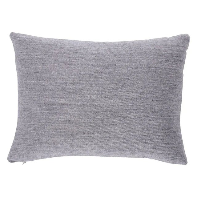 This pillow features Argento with a knife edge finish. Woven at an Italian fashion mill, this double-faced cashmere has a...