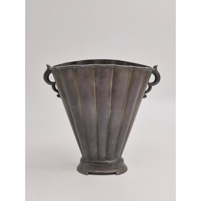 Danish Grace / Art Deco sculptural vase in disko metal by Just Andersen. The vase is in good condition, with hallmark in...