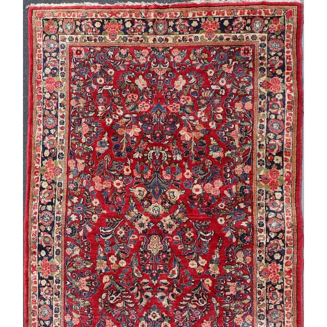 Keivan Woven Arts- Red background long antique Sarouk runner with all-over flower design, rug f-0208, country of origin /...