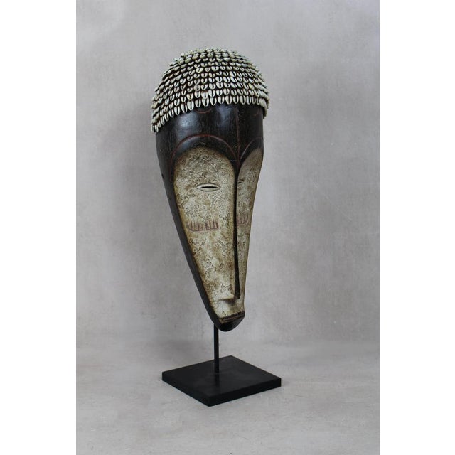 Well known for their reliquary figures the Fang also danced finely sculpted masks during a number of ritual activities....