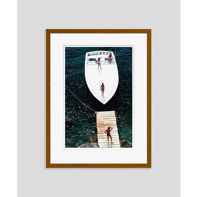 Modern Speedboat Landing 1973 by Slim Aarons Framed C-Print For Sale - Image 3 of 3
