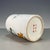 A charming Chinese porcelain brush pot (bitong). The cylindrical vessel features a creamy, all-over crackle glaze and is...