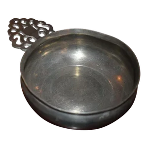 American Unmarked Pewter Porringer With a Pierced Crown Handle