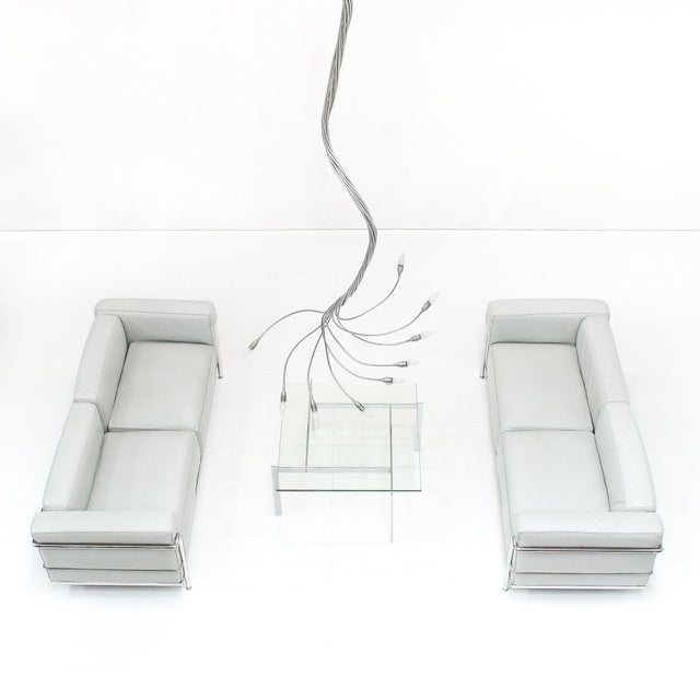 The lc3 sofa is an iconic piece of modernist design, designed in 1928 by le corbusier, pierre jeanneret, and charlotte...
